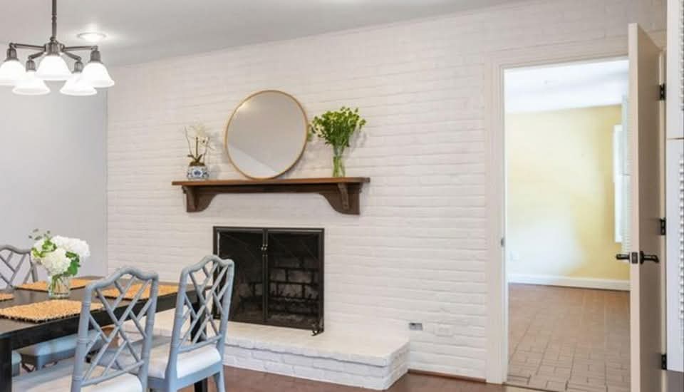 Updated fireplace wall and dining area